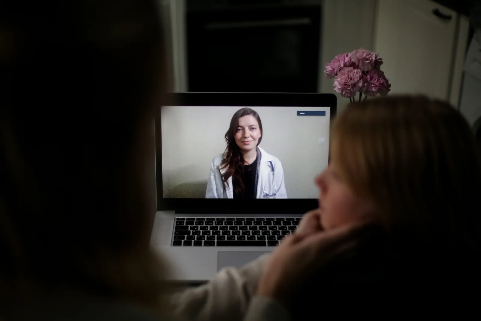 A person speaking with a qualified Australian practitioner by live video